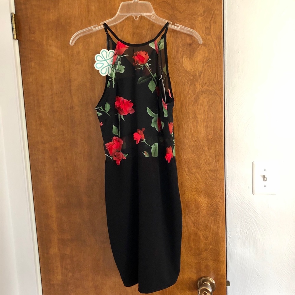 Black sleeveless dress with red roses